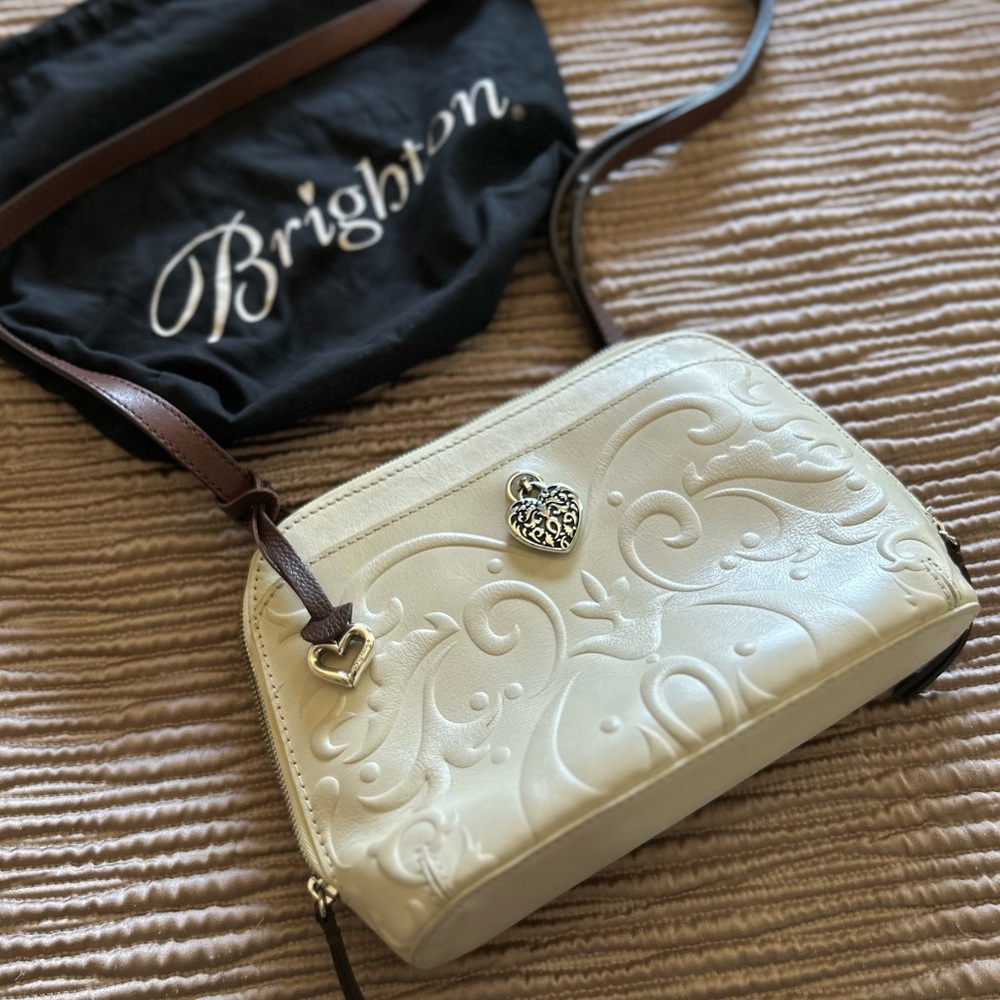 Creamy, white, leather brighten purse
